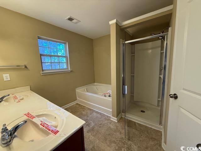237 Golden Oaks Drive Murrells Inlet, SC 29576 - Photo 21 of 21 Bathroom featuring double vanity, a garden tub, and a stall shower
