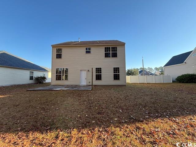 237 Golden Oaks Drive Murrells Inlet, SC 29576 - Photo 3 of 21 Back of house featuring a patio area