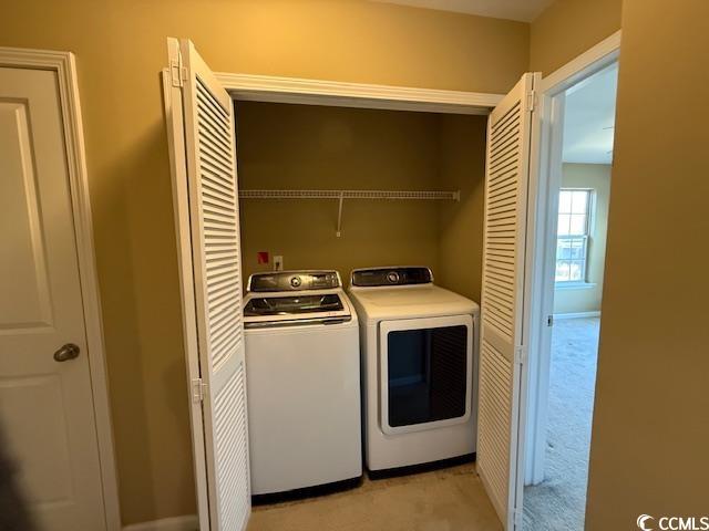 237 Golden Oaks Drive Murrells Inlet, SC 29576 - Photo 10 of 21 Laundry area with washing machine and dryer