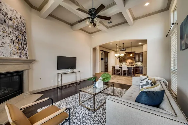 a bathroom with a granite countertop sink a toilet and bathtub
