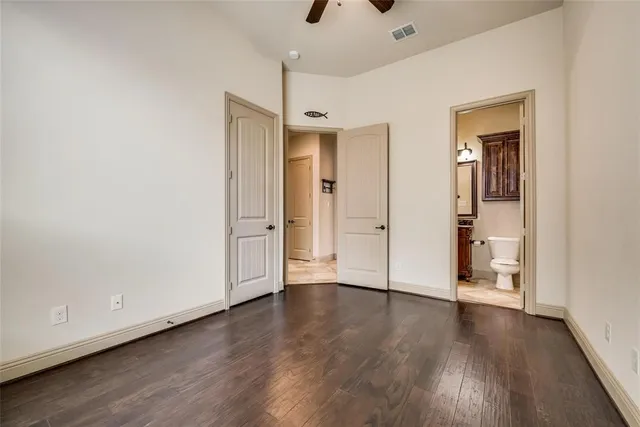 a view of a hallway with living room and dining room view