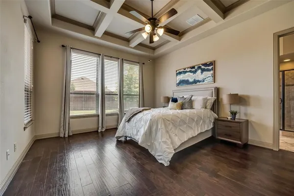 a spacious bathroom with a granite countertop tub sink and mirror