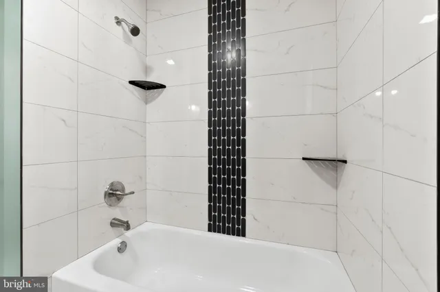 a bathroom with a bathtub