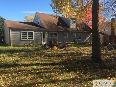 29 Roxy Avenue Edison, NJ 08820 - Photo 6 of 11 a front view of house with yard and trees around