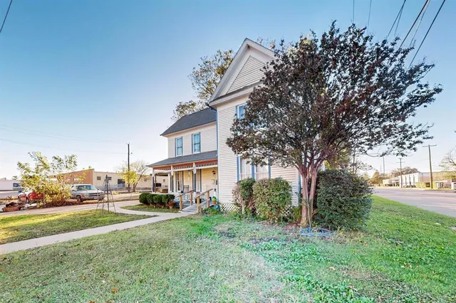 a car parked in front of a house