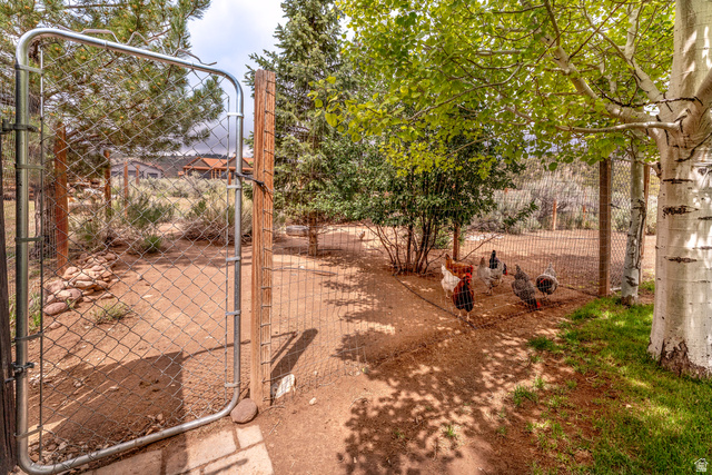 7343 North Sawtooth Cv Road Vernal, UT 84078 - Photo 40 of 64 Secure fenced enclosure featuring a chain-link gate