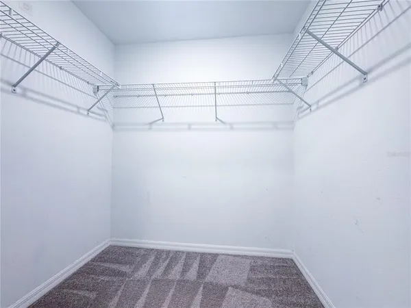 a view of a room with racks on the wall