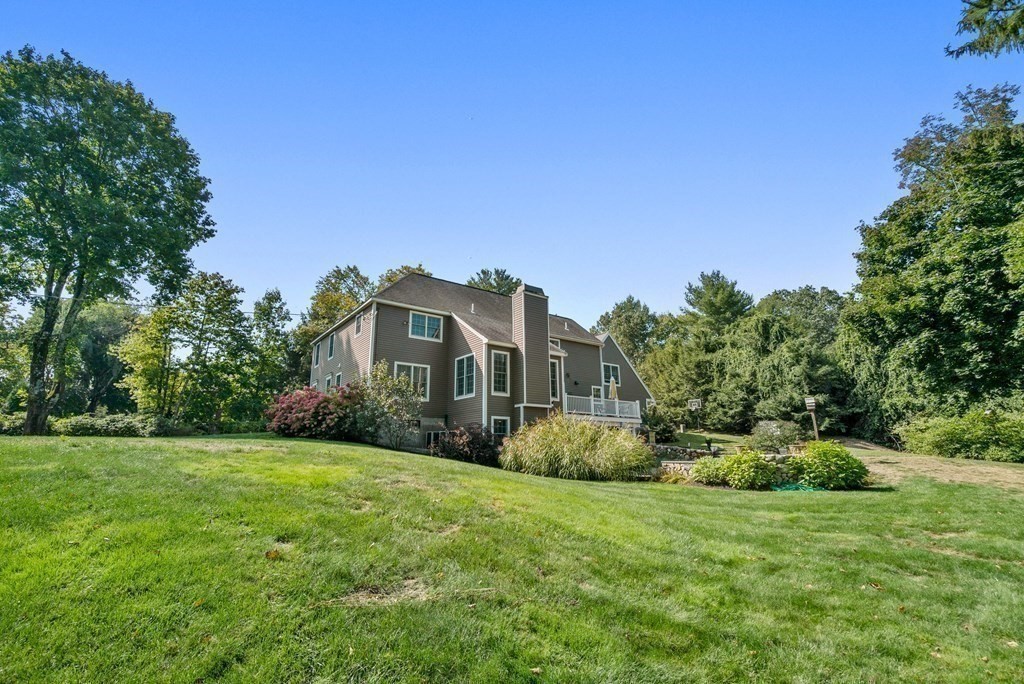 1 Barnbridge Circle Framingham, MA 01701 - Photo 37 of 42 a view of a garden with a building in the background
