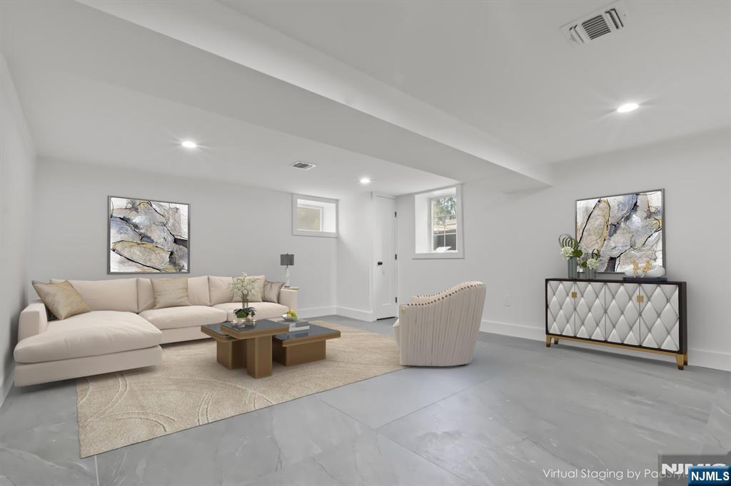 24 Ryder Road Fair Lawn, NJ 07410 - Photo 15 of 19 a living room with furniture and a couch
