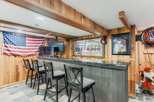 a kitchen with stainless steel appliances granite countertop a sink and cabinets