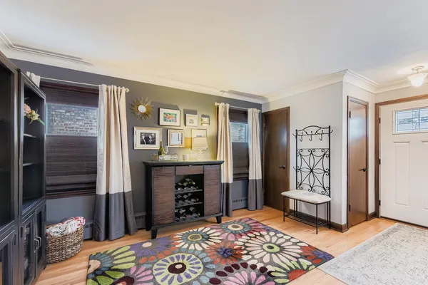 a bedroom with a bed and a television