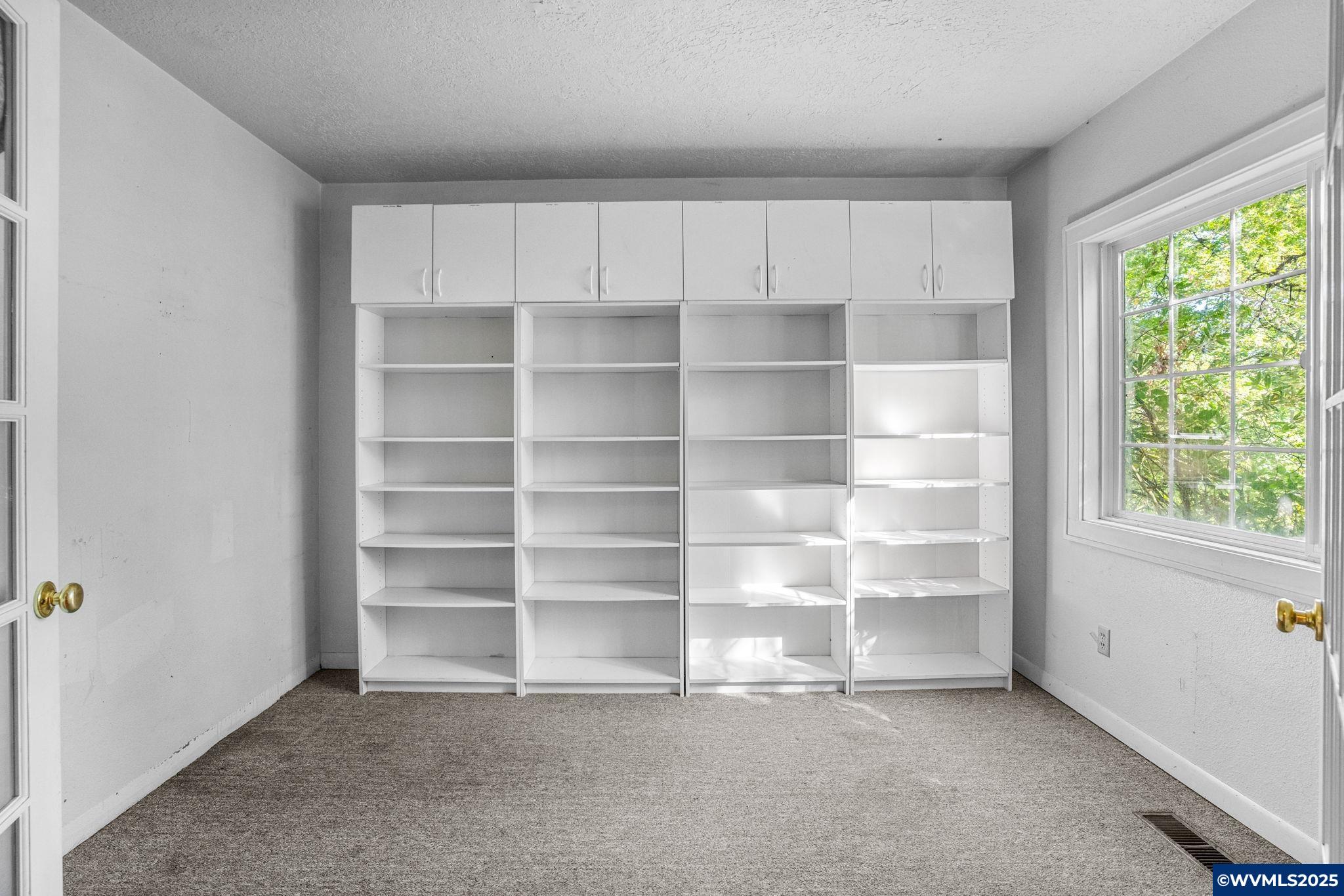 3495 River Road South Salem, OR 97302 - Photo 11 of 37 a view of an empty room with a window