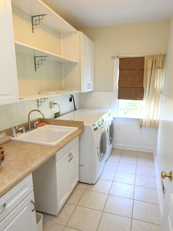 9205 Meadow Mist Court Raleigh, NC 27617 - Photo 11 of 25 Large convenient laundry room, washer and dryer are included, cabinets and laundry sink. Laundry