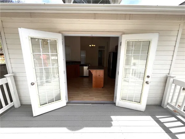 a view of a living room and entry way