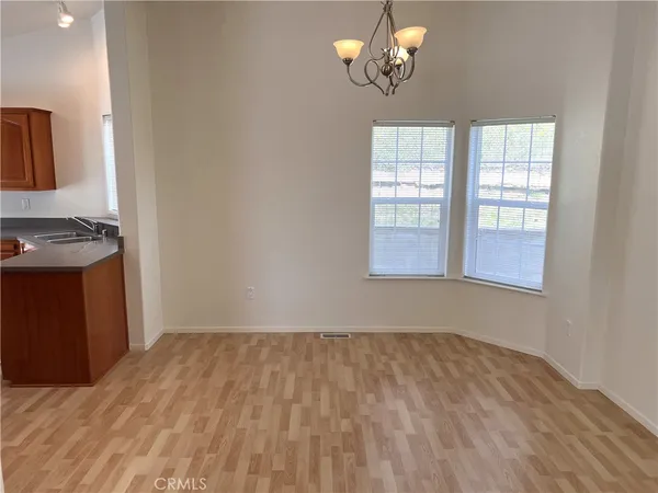 a view of a room with a chandelier