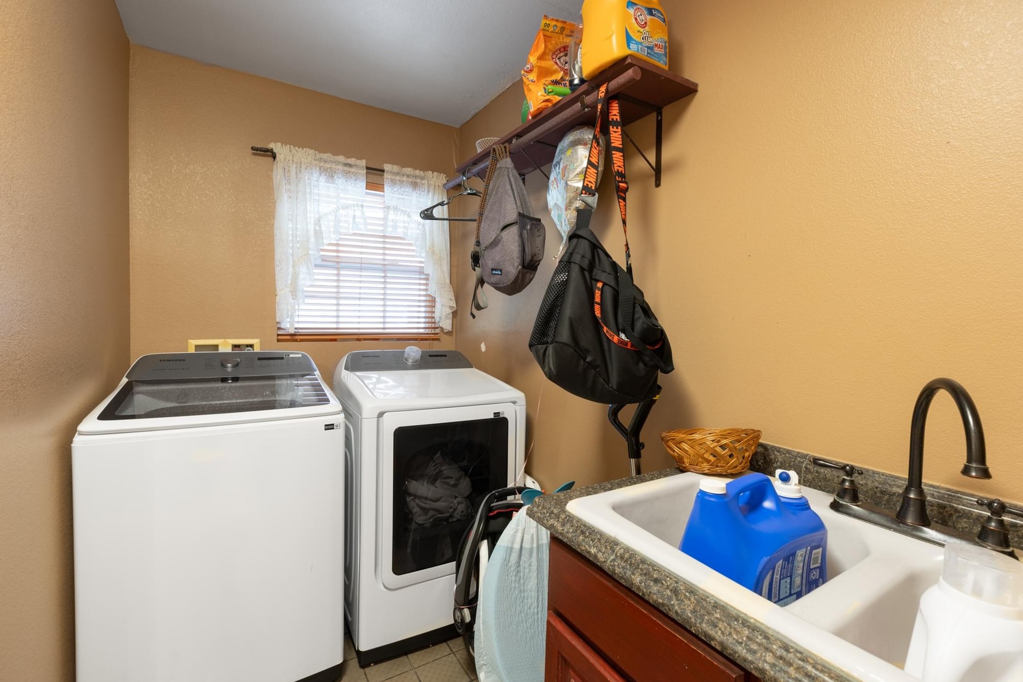 176 Old Lexington Road, Unit C Elgin, TX 78621 - Photo 19 of 31 a utility room with dryer and washer