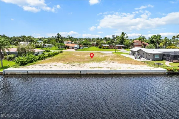 a view of a swimming pool with a lake view