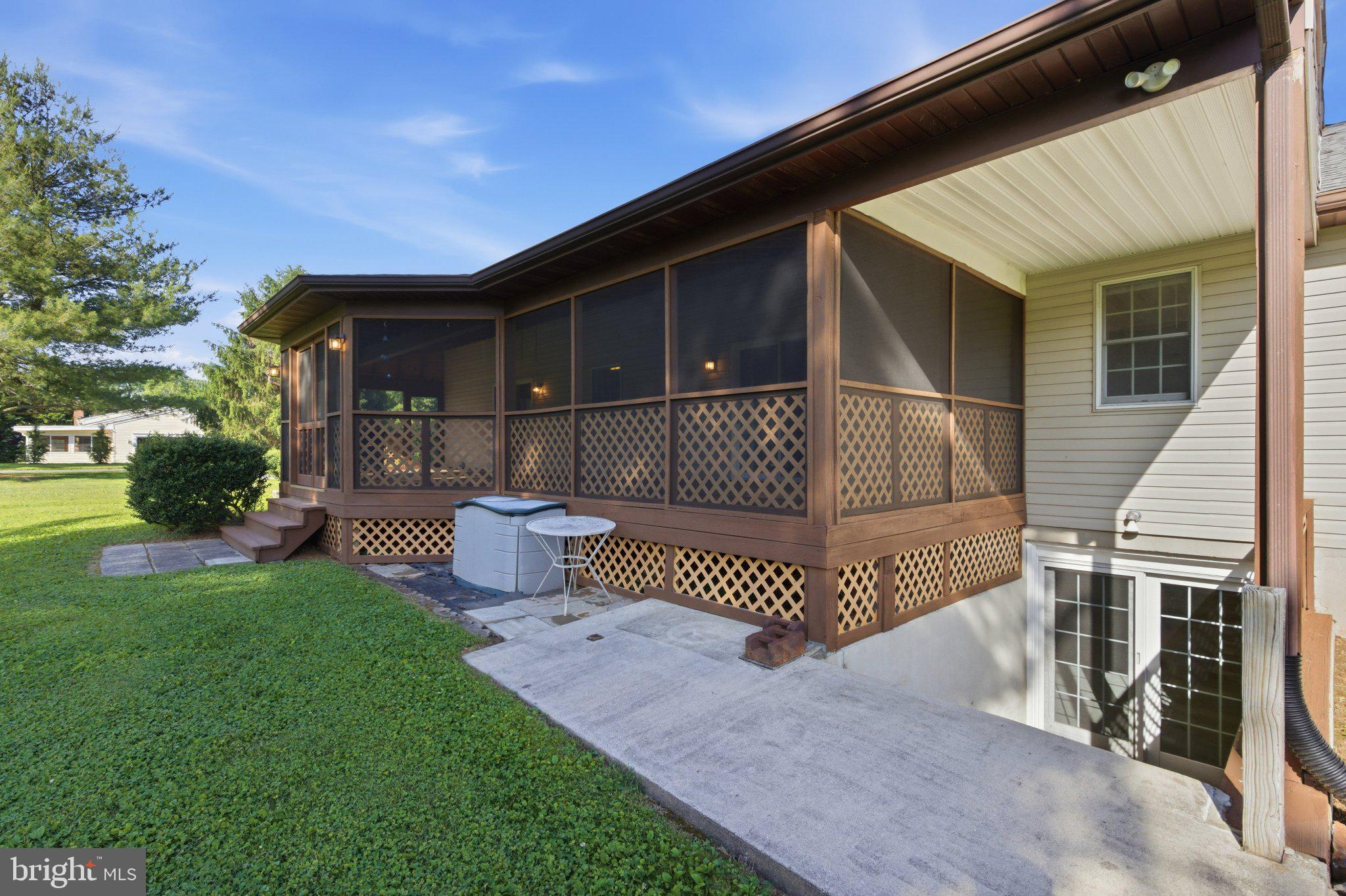 18310 Upper Beckleysville Road Hampstead, MD 21074 - Photo 46 of 67 Charming screened porch for outdoor bliss.