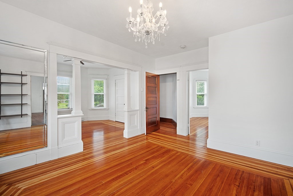 40 Orchard Street Chicopee, MA 01013 - Photo 16 of 34 a view of an empty room with wooden floor and a window