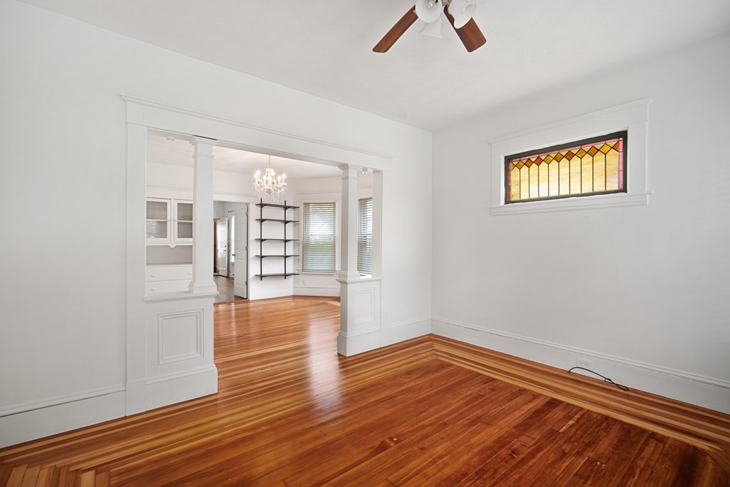 40 Orchard Street Chicopee, MA 01013 - Photo 18 of 34 a view of empty room with wooden floor and fan