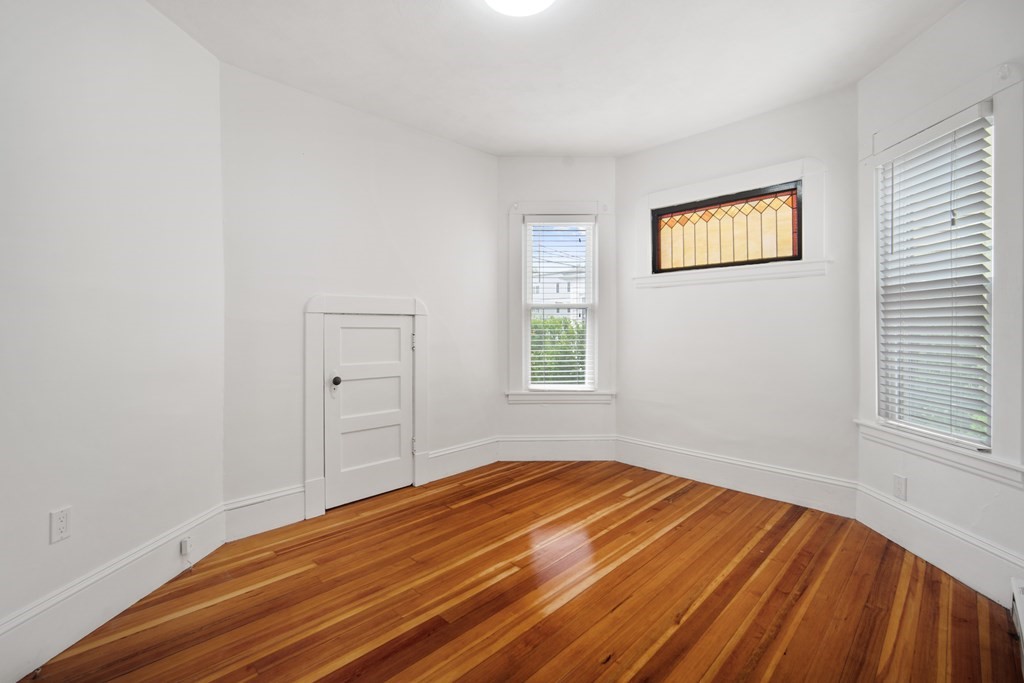 40 Orchard Street Chicopee, MA 01013 - Photo 20 of 34 a bedroom with a bed and a window