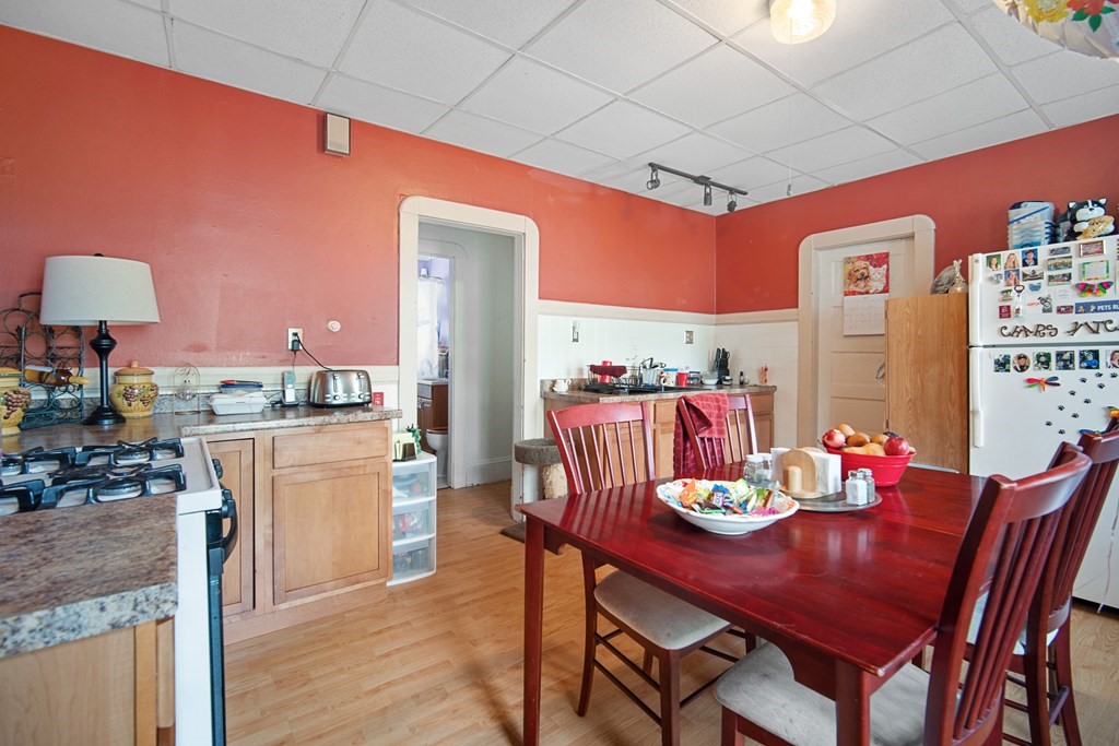 40 Orchard Street Chicopee, MA 01013 - Photo 27 of 34 a view of a dining room with furniture and wooden floor