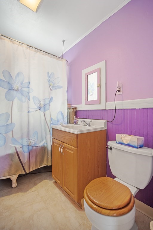 40 Orchard Street Chicopee, MA 01013 - Photo 28 of 34 a bathroom with a toilet a sink and bathtub