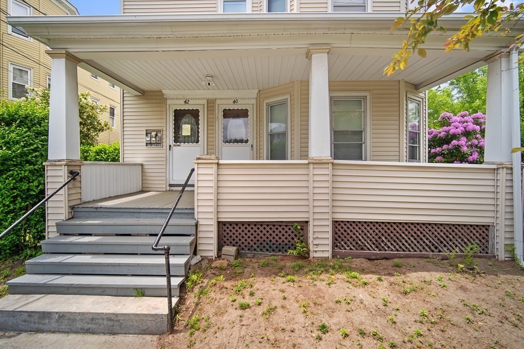 40 Orchard Street Chicopee, MA 01013 - Photo 5 of 34 a view of a house with a window