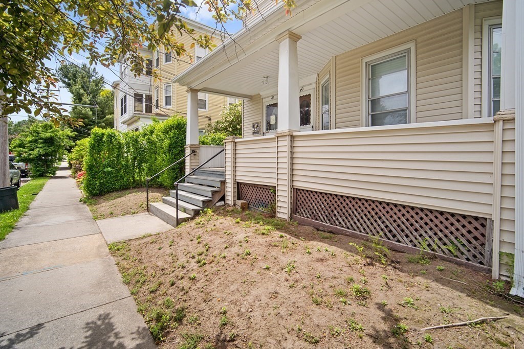 40 Orchard Street Chicopee, MA 01013 - Photo 6 of 34 a view of a house with a bench