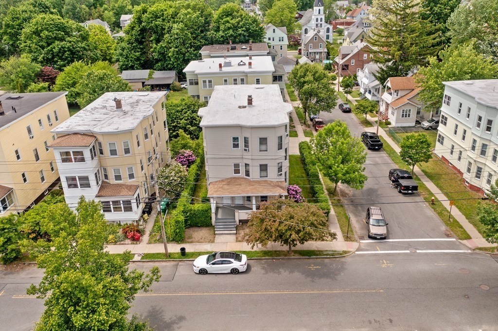 40 Orchard Street Chicopee, MA 01013 - Photo 9 of 34 an aerial view of multiple houses with a street