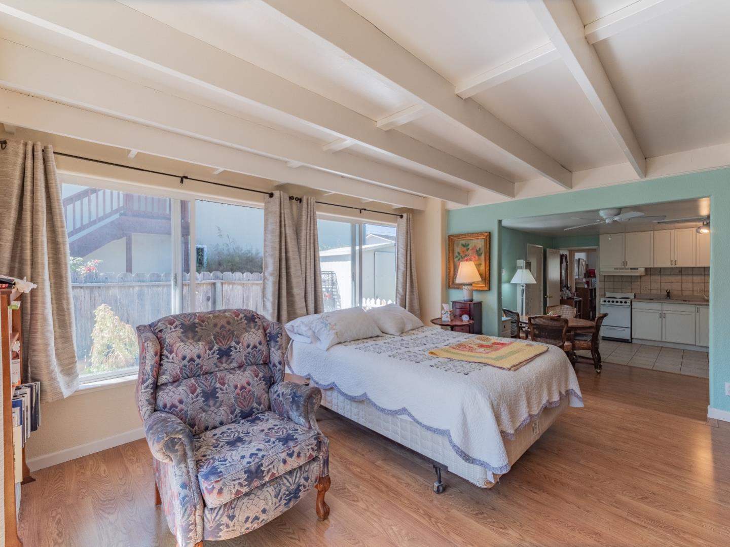 146 Hainline Road Aptos, CA 95003 - Photo 26 of 45 a bedroom with bed and large window