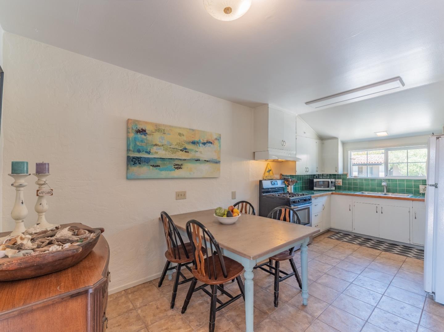 146 Hainline Road Aptos, CA 95003 - Photo 8 of 45 a view of a dining room with furniture and window