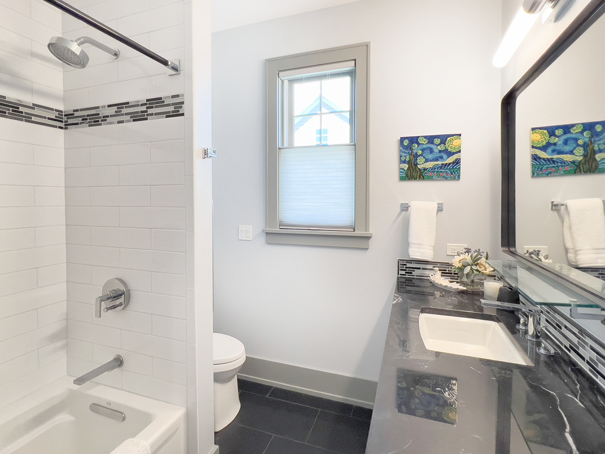 1812 Hunters Ridge Lane Sugar Grove, IL 60554 - Photo 23 of 45 a bathroom with a sink a toilet and shower