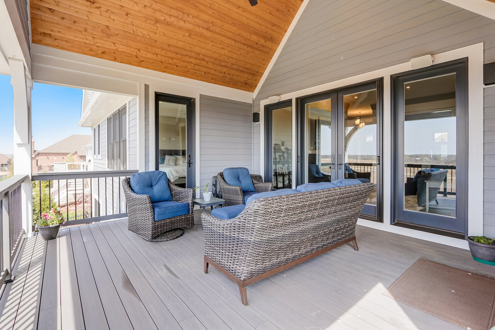 1812 Hunters Ridge Lane Sugar Grove, IL 60554 - Photo 24 of 45 a outdoor living space with furniture and large windows