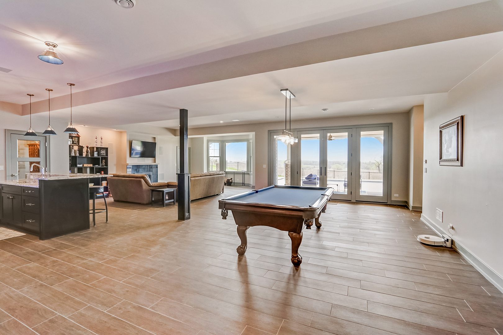 1812 Hunters Ridge Lane Sugar Grove, IL 60554 - Photo 34 of 45 a living room with furniture and a wooden floor