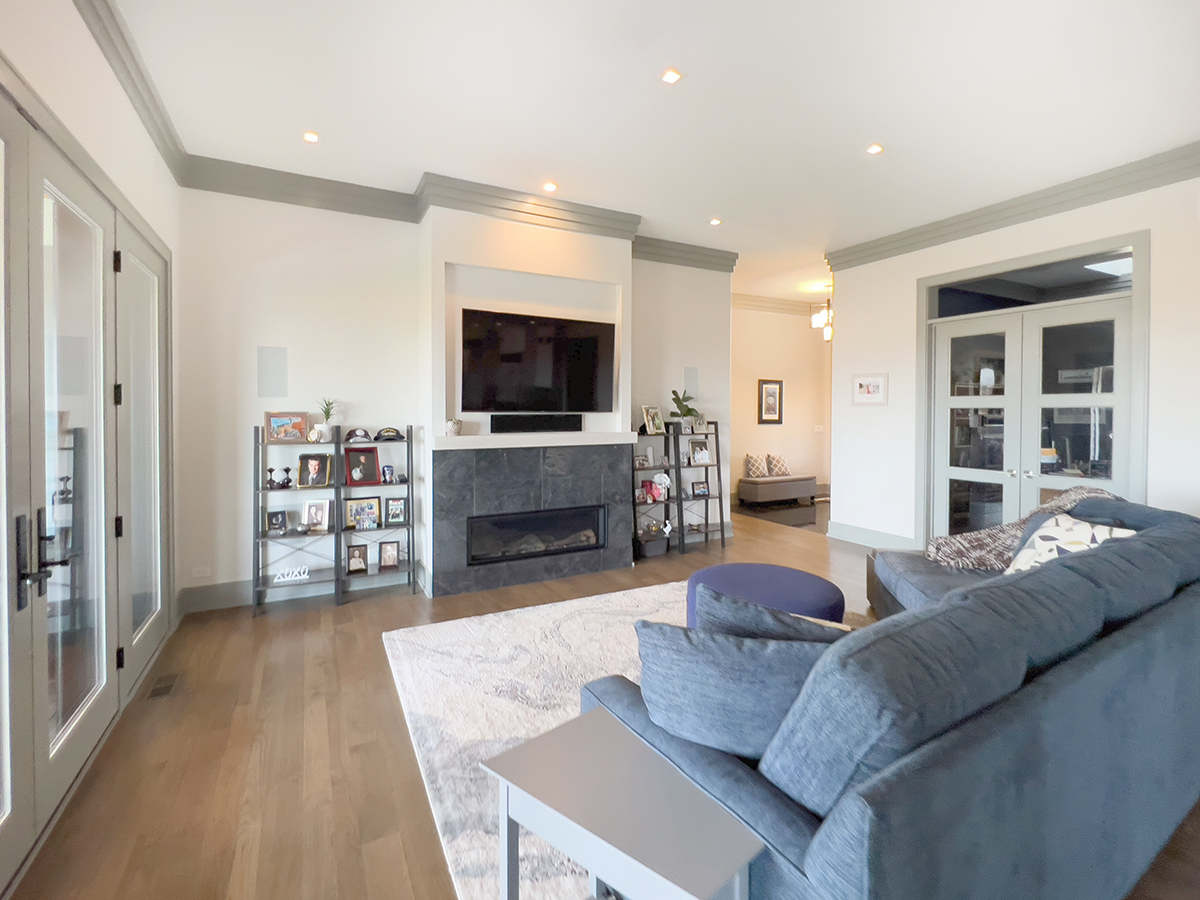 1812 Hunters Ridge Lane Sugar Grove, IL 60554 - Photo 6 of 45 a living room with furniture and a flat screen tv
