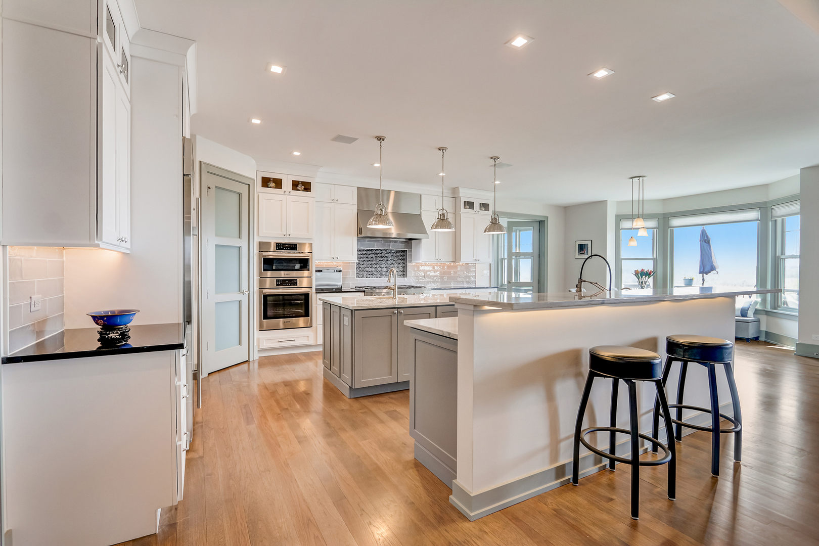 1812 Hunters Ridge Lane Sugar Grove, IL 60554 - Photo 10 of 45 a kitchen with a table chairs refrigerator and microwave