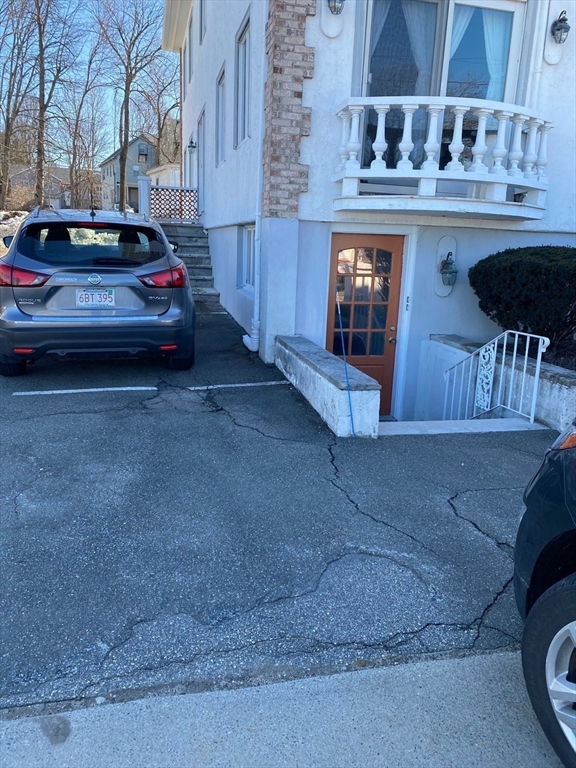 1 Salem Street, Unit B1 Wakefield, MA 01880 - Photo 2 of 12 a view of a car parked in front of a building