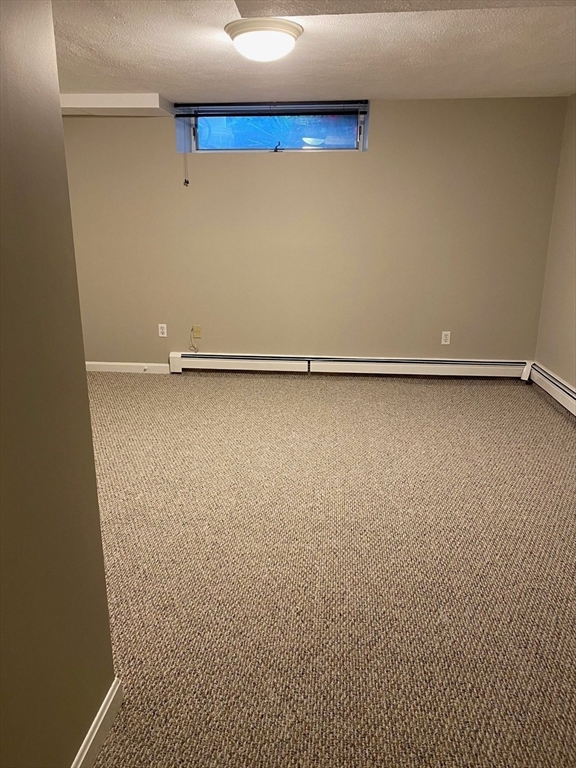 1 Salem Street, Unit B1 Wakefield, MA 01880 - Photo 5 of 12 a view of a room with an empty space