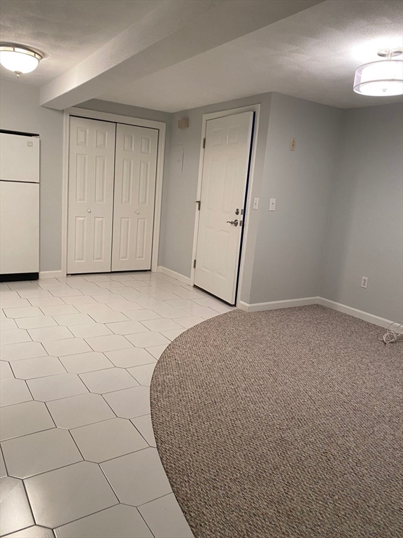 1 Salem Street, Unit B1 Wakefield, MA 01880 - Photo 7 of 12 a view of an empty room and entryway