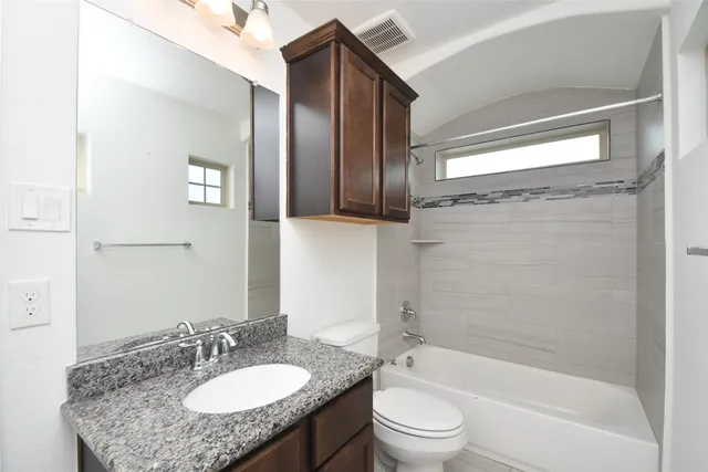 a view of a park with swings