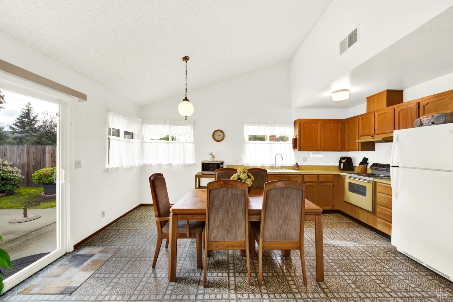 909 Seascape Circle Rodeo, CA 94572 - Photo 13 of 44 Vaulted ceilings in kitchen with lots of light