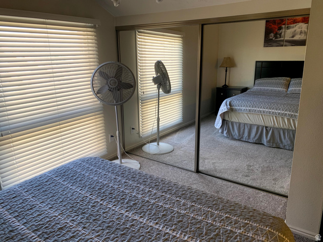 860 South Village Road, Unit B11 St. George, UT 84770 - Photo 11 of 19 Bedroom with a closet and carpet floors