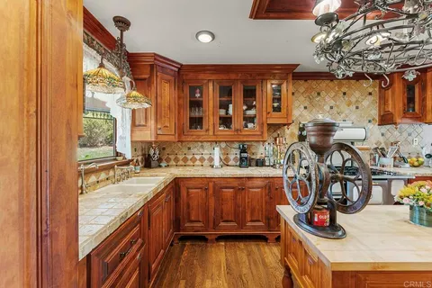 a very nice looking dining room with a large window