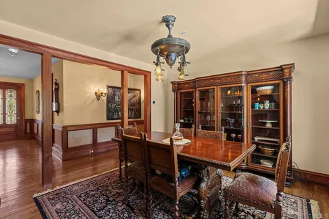 a view of a livingroom with furniture and a chandelier