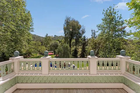 a view of a house with swimming pool