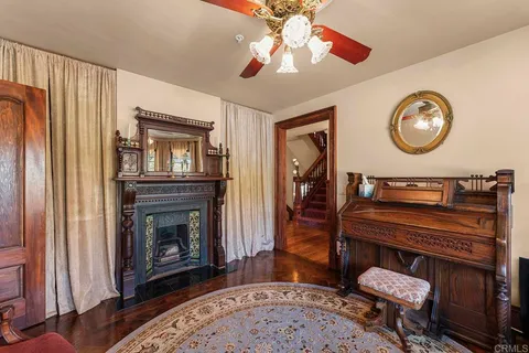 a view of a kitchen with kitchen island granite countertop a large window