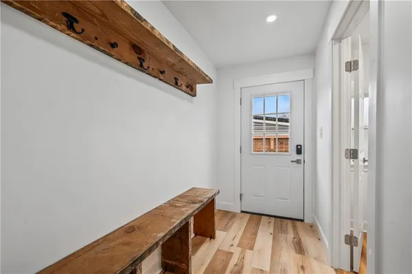 a view of a hallway with entryway