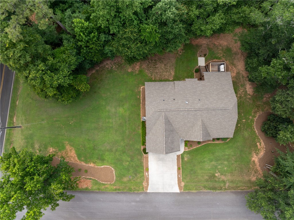 201 Hearthstone Drive Anderson, SC 29621 - Photo 38 of 49 An aerial perspective reveals a private home nestled amidst a vibrant green landscape with mature trees.
