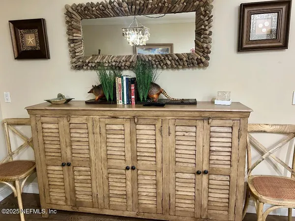 a view of a chairs and table in the patio